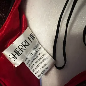Sherri Hill 52978 Long Sleeve Formal Mini Dress Red Black Shimmer Lace Up Back thumbnail 3
