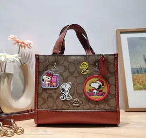 Coach X Peanuts Dempsey Tote 22 In Signature Canvas With Patches CE851 thumbnail 1