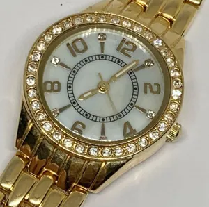 Women’s quartz analog gold tone wrist watch 28mm pearl dial 7”-7.5” running thumbnail 2