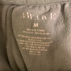 Awake sage green joggers that read “grow through life” thumbnail 3
