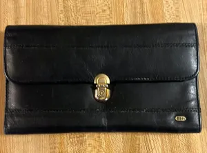 Calfskin leather wallet. Nice condition. Plenty of room for all your needs. thumbnail 1