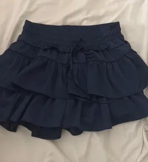 dark blue ruffle skirt thumbnail 1