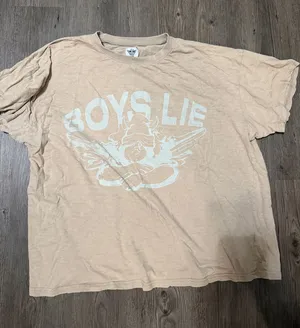 Boys Lie graphic tee with white graphic of a figure with wings thumbnail 1