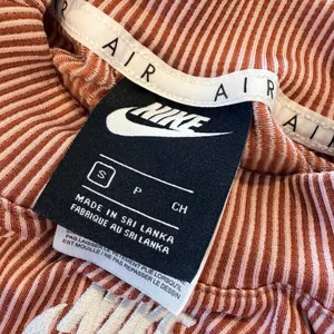 Nike Air Women's Sportswear Rib Crop Tank Top Mock Neck Slim Fit Canyon Rust Sm thumbnail 6
