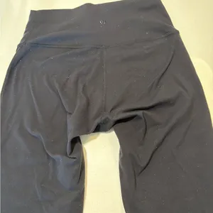 Lululemon black mesh leggings (flawed) size 4. thumbnail 7