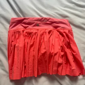 OLD lululemon pleated skirt in coral thumbnail 2