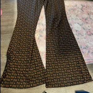 Anthropologie Sabine Flare Pants‎ Brown Black Motif Size Medium thumbnail 8