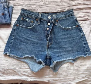 Levi's Medium Blue Button-Front Frayed Hem Denim Shorts thumbnail 1
