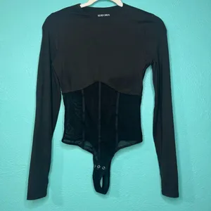 REORIA Women's Trendy Sexy Crew Neck Thumbholes Long Sleeve Sheer Mesh Bodysuit thumbnail 2