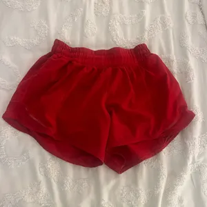 size 2 four inch red lululemon shorts, worn once. thumbnail 3