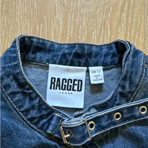 The Ragged Priest - Reign Buckle Sleeveless Denim Top in Blue thumbnail 2