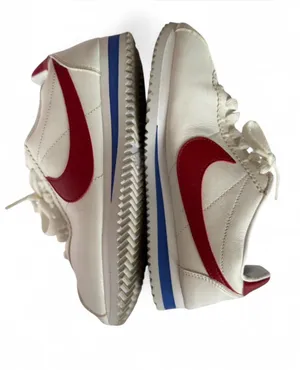 Nike Trainers White Sneakers with Red Swoosh and Blue Stripe thumbnail 1