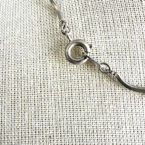Silver tone hanging star choker necklace thumbnail 3