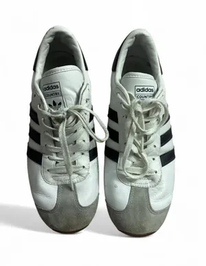 adidas White Low-Top Leather Sneakers with Black Logo thumbnail 1
