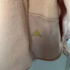 Essentials Golden Logo Sherpa Fleece Hoodie Blush Gold NWT thumbnail 5