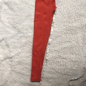 Orange high waisted yoga pants. Size XS. thumbnail 4