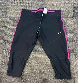 Nike Women’s Large DriFit Black with Pink Trim Capris thumbnail 1