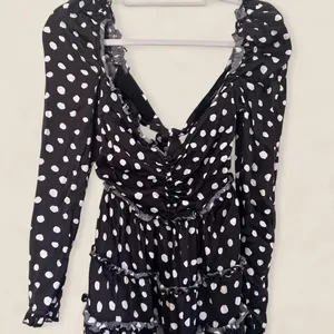 Majorelle black polka dot mini dress with ruffle details and tie-up front Small thumbnail 5