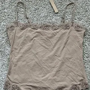 Lace Fits Everybody Bodysuit in the color sand. NWT thumbnail 2