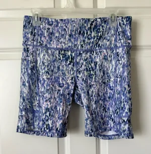 Athleta Ultimate Stash 7” Athletic Bike Shorts Size L thumbnail 1