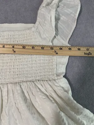 American Eagle cream romper with a tassel tie thumbnail 5