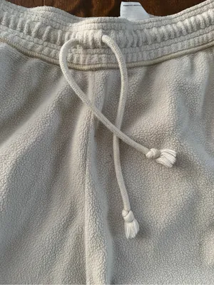 Nike Woman’s size Med Cream Sweatpants with Gold Swoosh Accent thumbnail 3