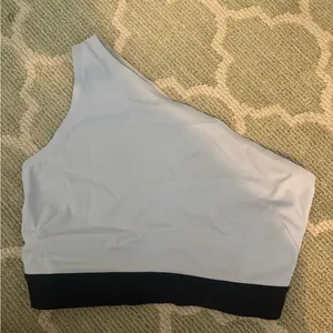 lululemon athletica One-Shoulder Sports Bra in white and black thumbnail 1