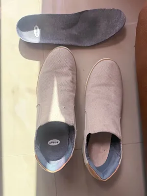 Dr. Scholl's "If Only" wedge slip-on sneakers in a light gray perforated suede material. thumbnail 14
