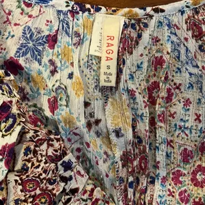 Raga Gorgeous dress with beautiful fit and subtle glitter throughout thumbnail 3