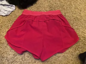 Pink alo yoga shorts thumbnail 1