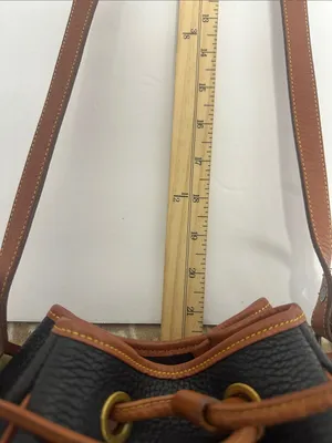 Dooney & Bourke Black Pebbled Leather Drawstring Bucket Bag with Tan Trim thumbnail 8