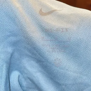 Nike Running Dri-FIT Swoosh mid-rise brief-lined shorts in pale blue size medium thumbnail 11