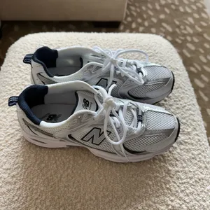 New Balance White and Black Sneakers thumbnail 3