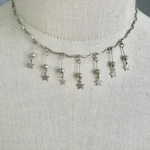 Silver tone hanging star choker necklace thumbnail 1