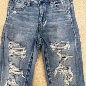 American Eagle Next Level Stretch Distressed Skinny Jeans Light Wash Size 0 thumbnail 3