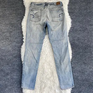 AMERICAN EAGLE LIGHT BLUE DISTRESSED BUTTON FLY BOY JEAN DENIM MID RISE thumbnail 5