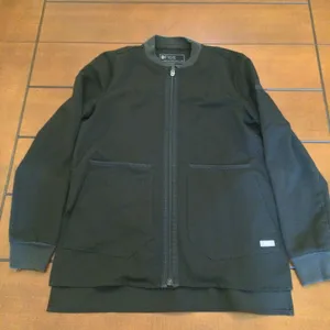 FIGS Bellery Scrub Jacket full-zip technical fabric black xs thumbnail 1