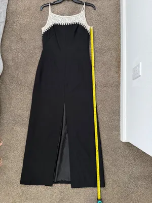 Elegant black maxi dress featuring a delicate cream lace yoke and thin straps. thumbnail 9