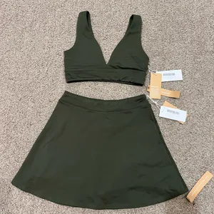 NWT Reformation Active Sports Bra and Skort Set in Fern Green thumbnail 1