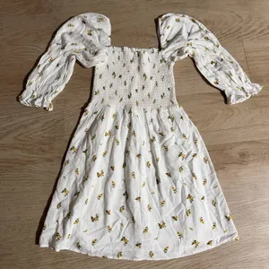 Kourt White Floral Smocked Mini Dress with Puff Sleeves thumbnail 1