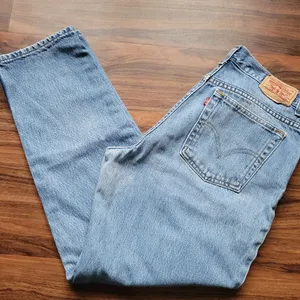Levis y2k 550 relaxed tapered leg jeans size 14 thumbnail 1