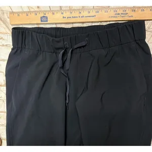Lululemon On The Fly Jogger Black High Rise Size 6 Stretch Comfort Yoga‎ thumbnail 6