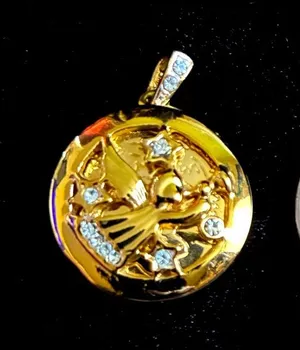 Locket pendant with an angel motif and rhinestone thumbnail 1