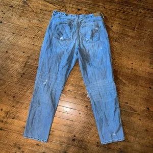American Eagle light wash destroyedrelaxed mom jeans thumbnail 3