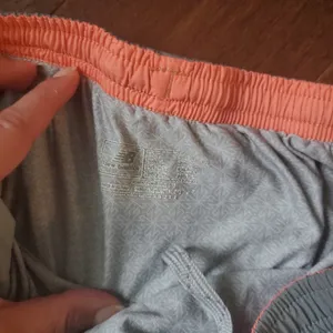 New balance size medium athletic shorts in gray and orange thumbnail 3
