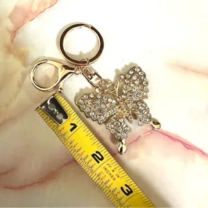 Gold tone butterfly rhinestone hang tag/keychain thumbnail 4