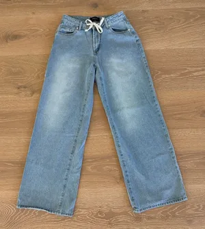 White Fox Mid Rise Jeans Kendall Wide Leg with Shoe String Size S in Blue thumbnail 1