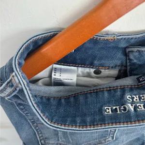 American Eagle Outfitters Distressed Blue Denim Roll-Hem Shorts thumbnail 4