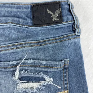 American Eagle High Rise Jeggings Super Stretch Destroyed Medium Wash Size‎ 4R thumbnail 7