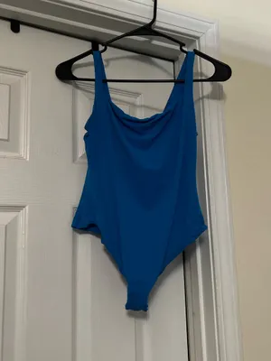 SKIMS Soft Stretch Bodysuit – Blue SKIMS bodysuit in a bright blue shade. Super soft and stretchy with a smooth, flattering fit. Only worn once and stored in a dresser since. No flaws. thumbnail 3